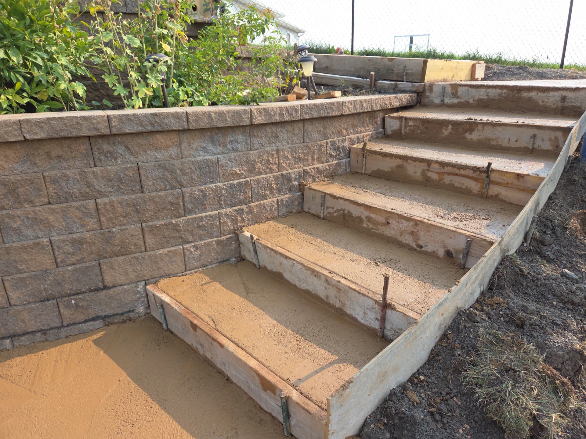 New Concrete Steps Built Along a Rapid City Retaining Wall