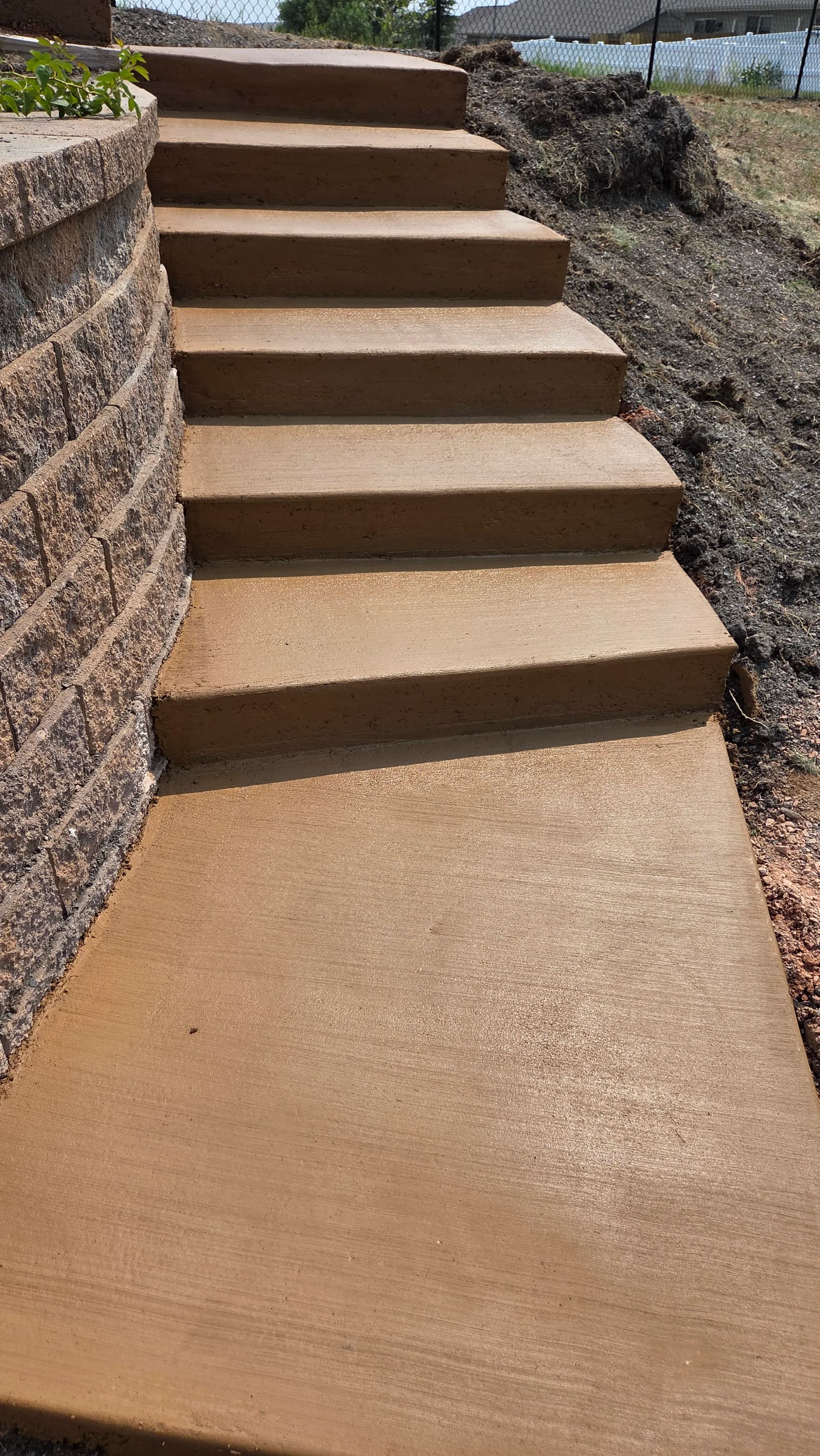 New Concrete Steps Built Along a Rapid City Retaining Wall