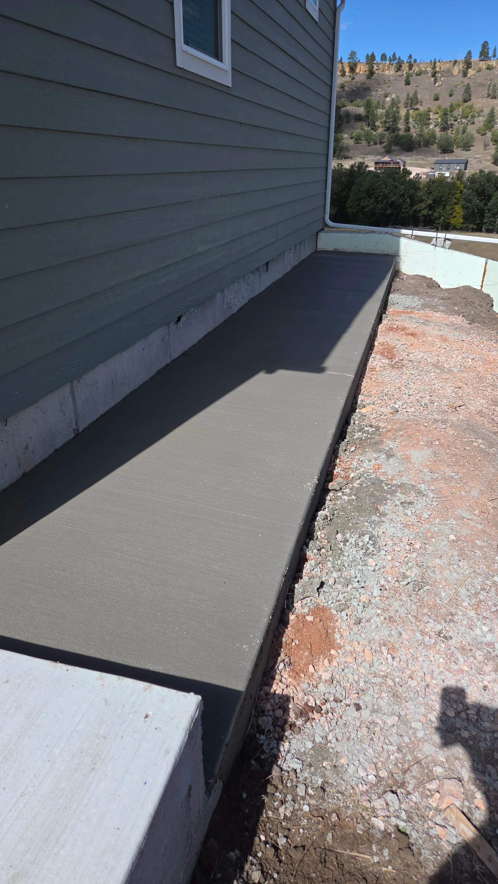 New Sidewalks and Shed Pad Poured in Belle Fourche image