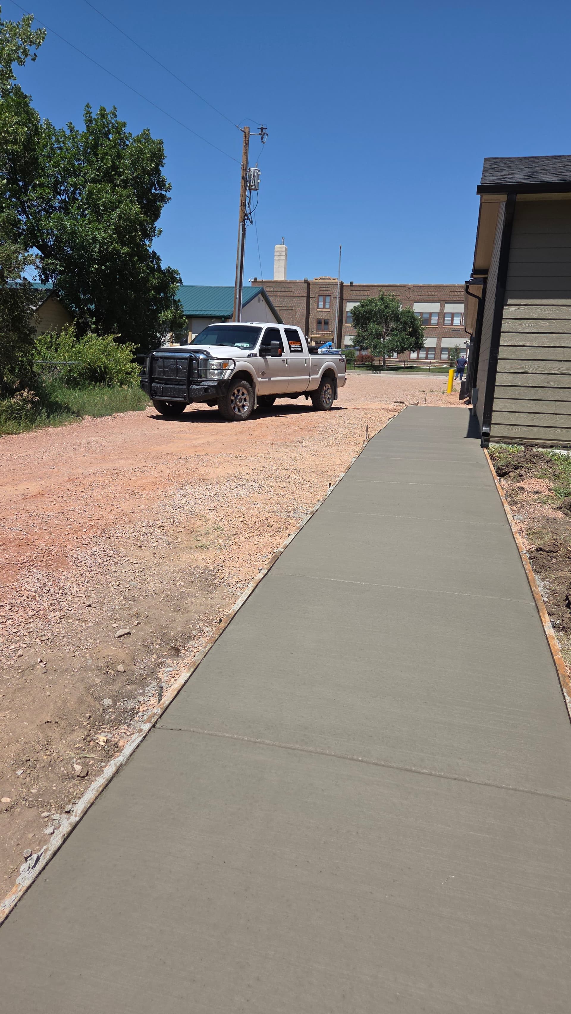 Gallery photos for New Concrete Sidewalk Installation at New Underwood School: Image #1